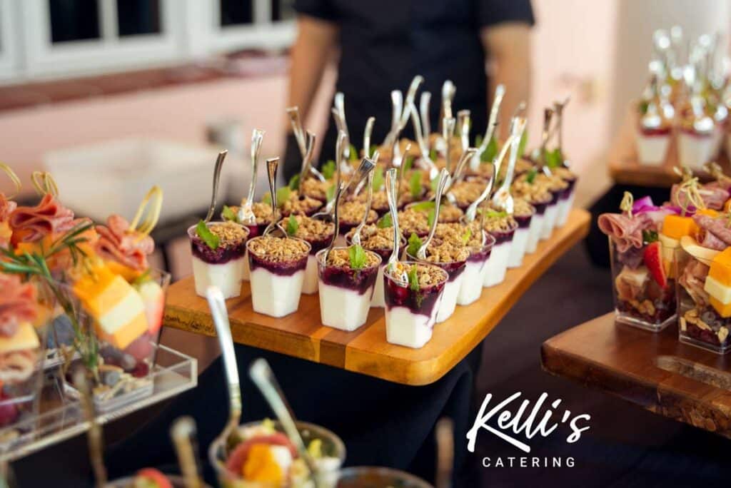 Catered table featuring Single serving hors d'oeuvres